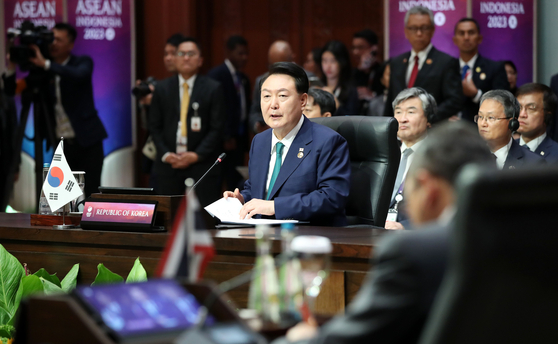 Korean President Yoon Suk Yeol, center, speaks during the South Korea-Asean summit at the Balai Sidang Jakarta Convention Center in Indonesia on Wednesday. [JOINT PRESS CORPS]