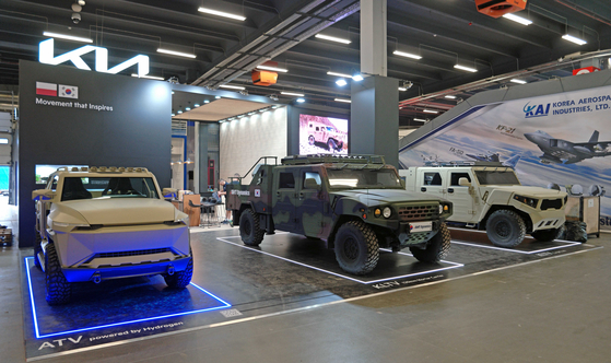 Kia's military vehicles including a hydrogen-power ATV concept car, far left, are displayed at the MSPO 2023 arms fair held in Kielce, Poland. [KIA]