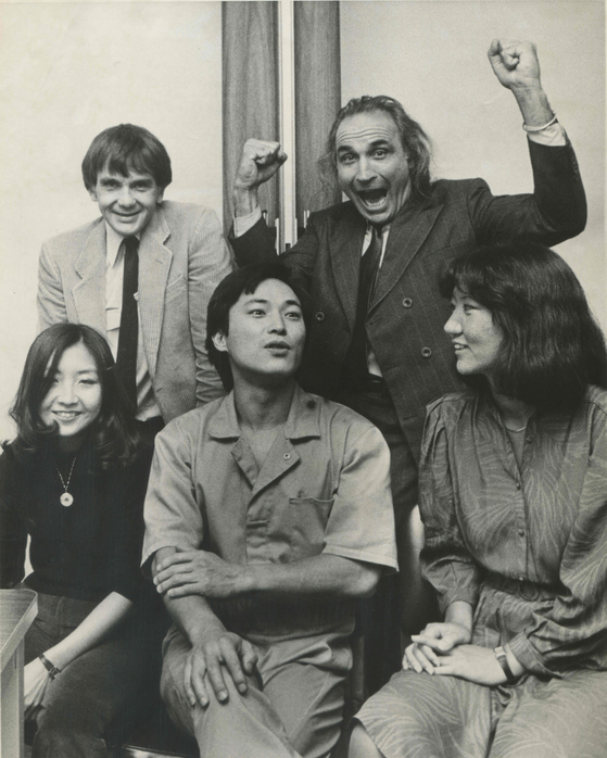 Chol Soo Lee, front center, is shown with lawyers and activists who fought for his retrial after his release from prison in 1983. [CONNECT PICTURES]