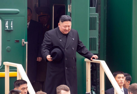 In this April 2019 photo released by the regional government of Primorsky Kai in the Russian Far East, North Korean leader Kim Jong-un disembarks from a train at Khasan Station, the last railway stop on the Vladivostok branch of the Russian Far Eastern Railway before the North Korean-Russian border. The photo was taken during Kim's last overseas trip, which was to Vladivostok to meet Russian President Vladimir Putin. [YONHAP]