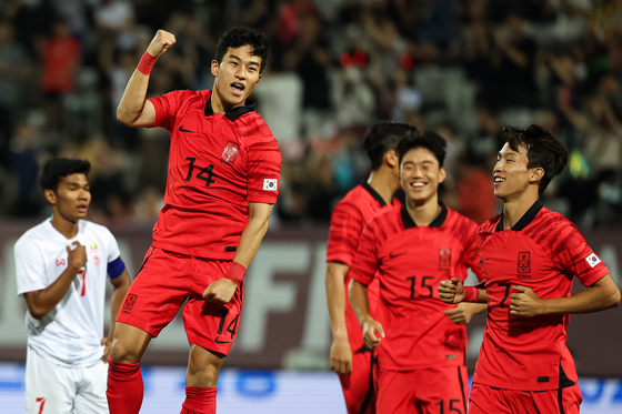 Korea's Paik Sang-hoon, left, celebrates scoring a goal during an AFC U-23 Asian Cup qualifier against Myanmar at Changwon Football Center in Changwon, South Gyeongsang on Tuesday. [NEWS1] 