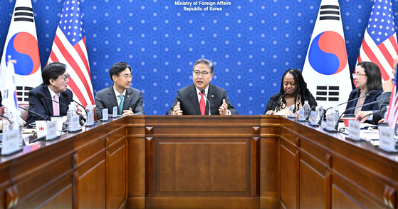 Foreign Minister Park Jin, center, poses with participants in Extended Deterrence Strategy and Consultation Group talks at the ministry’s headquarters in central Seoul on Friday. [MINISTRY OF FOREIGN AFFAIRS]