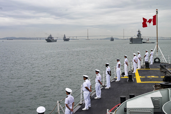 HMCS Vancouver participates in a re-enactment of the Incheon Landing Operation and a Fleet Review with Republic of Korea Navy Ships and USS America on Friday in Incheon. [ALISA STRELLEY/CANADIAN ARMED FORCES PHOTO]