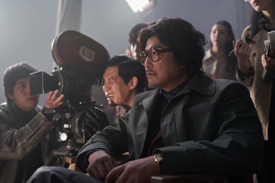 Actor Song Kang-ho plays Kim Yeol, a film director in the 1970s who is obsessed with making a masterpiece out of his film ″Cobweb,″ in the upcoming film by director Kim Jee-woon ″Cobweb″ [BARUNSON E&A]
