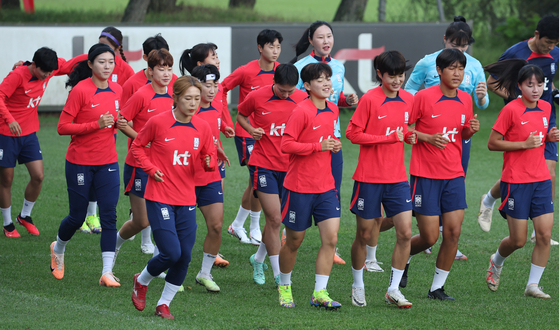The Korean women's football team trains at the Paju National Football Center in Paju, Gyeonggi on Monday ahead of the Hangzhou Asian Games. [YONHAP] 