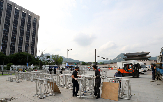 A stage for an outdoor cheering event for a 2023 U-20 World Cup match between Korea and Italy in Argentina is being installed at the Gwanghwamun Square in central Seoul on June 8. [NEWS1]