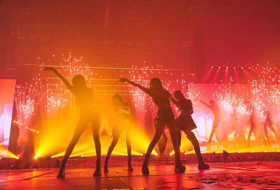 Blackpink performs during a two-day finale concert for its "Born Pink" world tour on Saturday and Sunday at the Gocheok Sky Dome indoor arena in western Seoul. [YG ENTERTAINMENT]