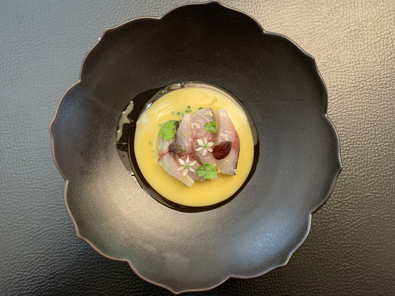 A mackerel dish served as part of the collaboration menu at Jungsik Seoul in light of the 2023 Taste of Seoul week. [LEE JIAN]