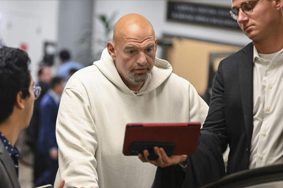 Sen. John Fetterman (D-Pa.) near the Senate subway at the U.S. Capitol in Washington, on July 11, 2023. The new rules relaxing the Senate dress code appear to have been changed mainly to accommodate Fetterman. [Kenny Holston/The New York Times]