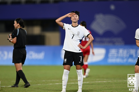 Son Hwa-yeon celebrates after scoring a goal against the Philippines at WZ Sports Centre Stadium in Hangzhou, China on Monday.  [YONHAP]