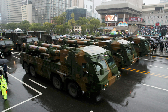 The South Korean military’s Hyunmoo surface-to-surface missiles are showcase in a large-scale military parade passing Gwanghwamun Square in central Seoul Tuesday, marking the 75th Armed Forces Day. [JOINT PRESS CORPS]