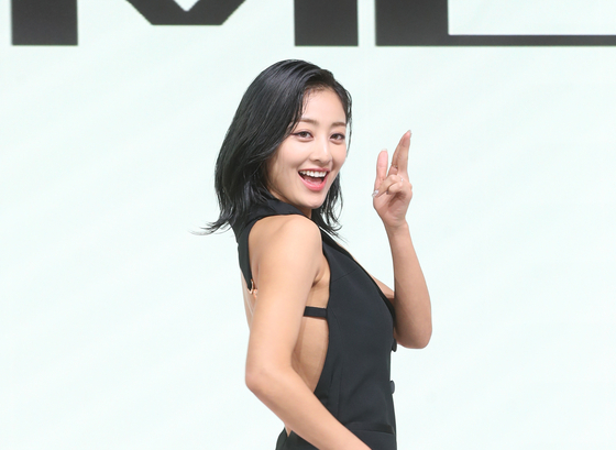 Jihyo of girl group Twice poses for photos during a press conference held at the Fairmont Ambassador Seoul hotel in western Seoul in celebration of her first solo album, ″Zone,″ released on Friday. [NEWS1]