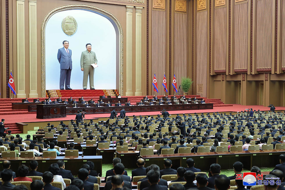 An image issued by North Korean state media Korean Central News Agency on Sept. 28, shows North Korean leader Kim Jong-un as he attends a meeting of the country's parliament, where it unanimously enshrined the nuclear program in the constitution, during a two-day session in Pyongyang, North Korea. [YONHAP]