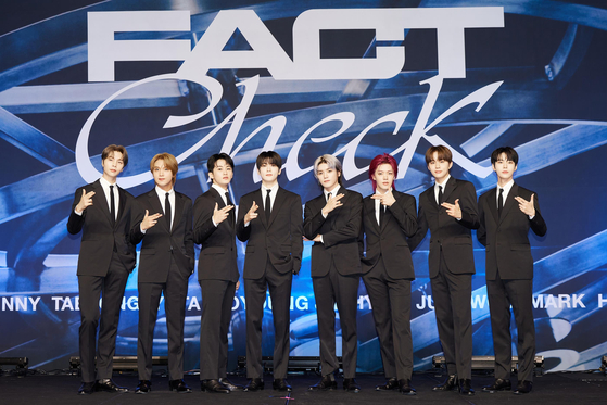 Members of boy band NCT 127 pose for photos during a press conference held on Friday at the Conrad Seoul hotel in western Seoul for its fifth full-length album ″Fact Check.″ [SM ENTERTAINMENT]