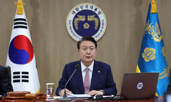 President Yoon Suk Yeol speaks on the Israel-Hamas conflict during a Cabinet meeting at the Yongsan presidential office in central Seoul on Tuesday. [JOINT PRESS CORPS]