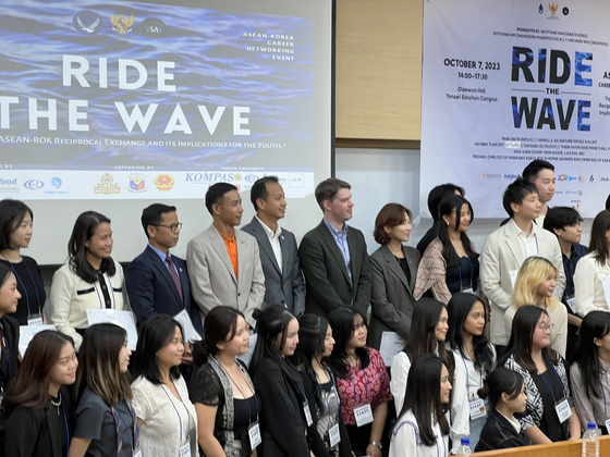 Attendees of the Ride the Wave symposium at Yonsei University pose for a photo at the event on Saturday. [LEE TAE-HEE]