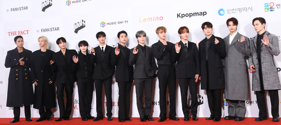 Boy band Seventeen poses for a photo at the red carpet event of the 2023 The Fact Music Awards, held at the Namdong Gymnasium in Incheon on Tuesday. [NEWS1]