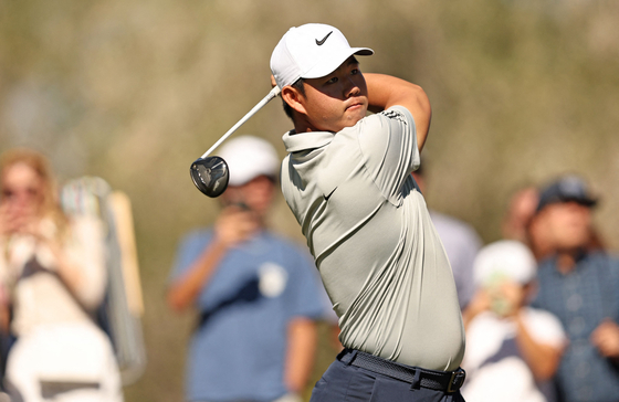 Tom Kim, also known as Kim Joo-hyung, hits his shot from the fourth tee during the third round of the Shriners Children's Open at TPC Summerlin in Las Vegas, Nevada on Saturday. [AFP/YONHAP] 
