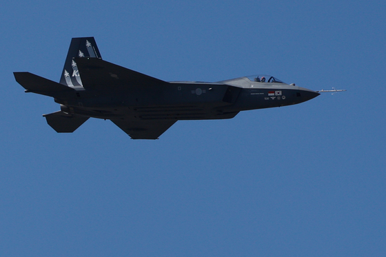 The KF-21 Boramae, the country's first indigenously developed supersonic fighter jet, flies over Seoul Air Base in Seongnam, Gyeonggi, during a test flight held Monday, a day before the six-day 2023 Seoul International Aerospace & Defense Exhibition (ADEX) officially begins. [NEWS1] 