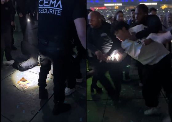 A video from X (formerly Twitter) shows security guards forcing an Asian male on the ground and escorting him from the arena, sparking accusations of racism towards Asians. [SCREEN CAPTURE] 