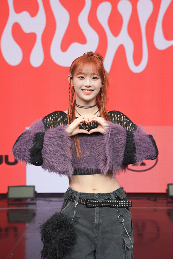 Chuu poses for cameras during a showcase event for her first solo album ″Howl″ at the Yes24 Live Hall in Gwangjin District, eastern Seoul, on Wednesday. [ATRP]