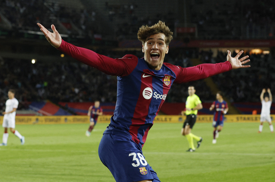 FC Barcelona's Marc Guiu celebrates scoring his first goal for the club during a La Liga match against Athletic Club at Estadi Olimpic Lluis Companys in Barcelona, Spain on Sunday. [REUTERS/YONHAP] 