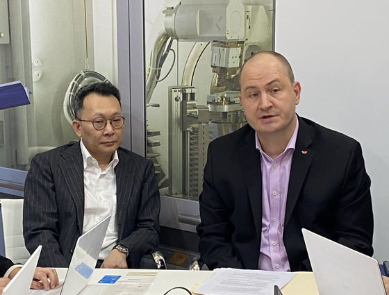 SK pharmteco CEO Joerg Ahlgrimm, right, and Kim Yeon-tae, head of SK Bio Investment Center at SK Inc., during an interview at the Fira Barcelona Gran Via conference center in Barcelona, Tuesday, where the CPHI Worldwide 2023 is taking place [SK PHARMTECO]
