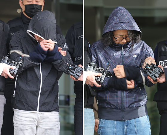 From left, Yoo Sang-won and his wife Hwang Eun-hee, stand before a police precinct in Gangnam, southern Seoul, before they are handed over to the prosecution on April 13. [YONHAP] 