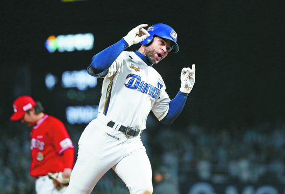 Jason Martin of the NC Dinos rounds the bases after hitting a three-run home run during a playoff game against the SSG Landers at Changwon NC Park in Changwon, South Gyeongsang on Wednesday.  [NEWS1]