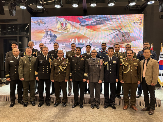 Defense Attache of Egypt Brig. Gen. Hossam Elsheikh, fourth from front left, and defense attaches in Korea celebrate the 50th Egyptian Armed Forces Day on Wednesday at the Ambassador Seoul - A Pullman Hotel. [EMBASSY OF EGYPT IN KOREA]