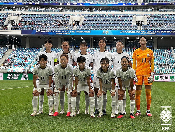 The South Korea women's football team poses for a photo before a Paris Olympic qualifer match against North Korea at Xiamen Egret Stadium in Xiamen, China on Sunday. [YONHAP] 