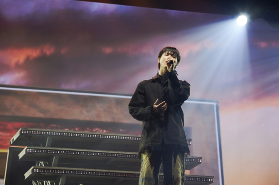 Singer Woodz kicked off ″OO-LI and″ encore world tour with a two-day performance at the SK Olympic Handball Gymnasium in Songpa District, southern Seoul over the weekend [EDAM ENTERTAINMENT] 