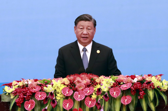 Chinese President Xi Jinping delivers opening remarks at the Belt and Road Forum at the Great Hall of the People in Beijing on Oct. 18. [YONHAP]