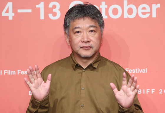 Japanese director Hirokazu Kore-eda poses for a photo at the screening of ″Monster″ at the KNN Theater in Bsuan during the 28th Busan International Film Festival on Oct. 7. [NEWS1]