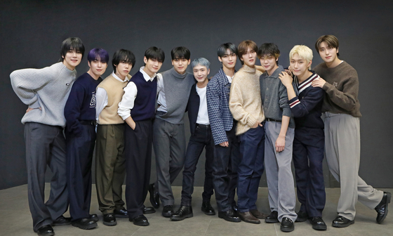 Members of boy band Omega X pose for photos after an interview with the Korea JoongAng Daily at the JTBC headquarters in Sangam-dong, western Seoul, on Nov. 3. [PARK SANG-MOON]