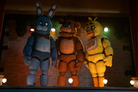 A scene from ″Five Nights at Freddy's,″ Blumhouse Production's latest horror film about a security guard who encounters haunted animalistic robots at a pizzeria [UNIVERSAL PICTURES]
