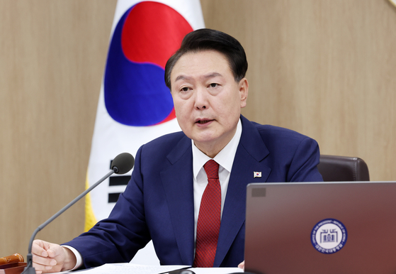 President Yoon Suk Yeol speaks in a Cabinet meeting at the Yongsan presidential office in central Seoul Tuesday. [JOINT PRESS CORPS]