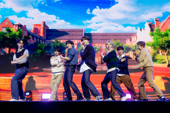 Ampers&One, FNC Entertainment's new seven-member boy band, performs during its debut showcase at the Blue Square in Yongsan District, central Seoul. [FNC ENTERTAINMENT]