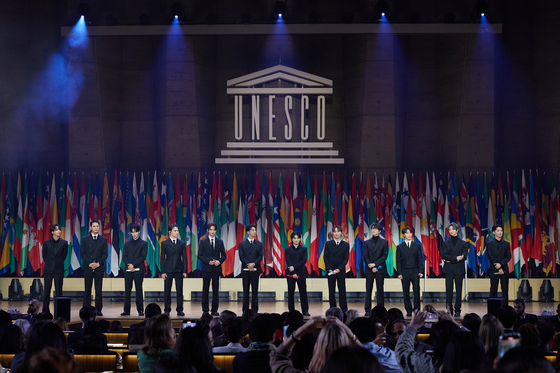 Boy band Seventeen gives a speech at the 13th Unesco Youth Forum in Paris on Nov. 14. [PLEDIS ENTERTAINMENT]