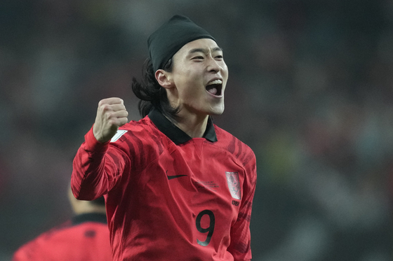 Korea's Cho Gue-sung celebrates after scoring the opening goal during the second round of the Asian qualifier group C match for 2026 World Cup against Singapore at Seoul World Cup Stadium in western Seoul on Thursday. [AP/YONHAP]