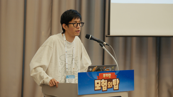 Bae Hyung-ook, the head developer for the game publisher Devsisters' upcoming Cookie Run: Tower of Adventures, introduces the new game for the G-Star 2023 game festival held at Busan's Bexco convention center Friday. [DEVSISTERS]