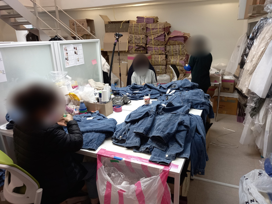 Workers inside the influencer's company located in Gangnam, Seoul. [YONHAP] 