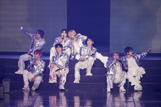 Boy band NCT 127 members perform on stage at the KSPO Dome in southern Seoul on Sunday for the ″Neo City: Seoul - The Unity″ concerts, the first part of ″The Unity″ tour by the group. [SM ENTERTAINMENT]