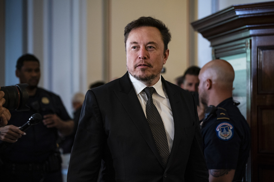 Elon Musk, CEO of X/Tesla, arriving at the bipartisan A.I. Insight Forum organized by Senate Majority Leader Chuck Schumer (D-N. Y.), along with labor union leaders and civil society groups, at the Capitol in Washington on, Sept. 13, 2023. [Haiyun Jiang/The New York Times]