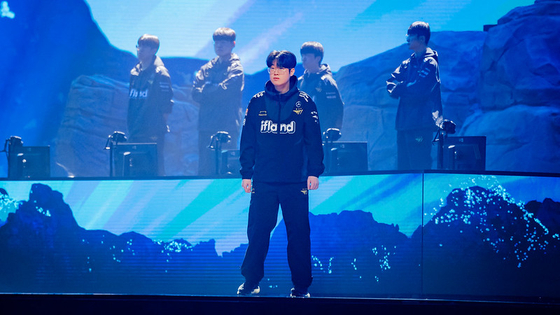 T1's Choi ″Zeus″ Woo-je stands on the stage ahead of the final round at the 2023 League of Legends World Championship, where he would later be named MVP, at Gocheok Sky Dome in Western Seoul on Sunday. [RIOT GAMES]