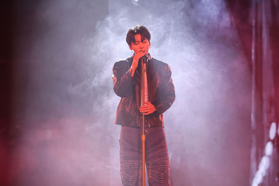 BTS' Jungkook performs at his showcase, ″Golden,″ on Monday at Jangchung Arena in Jung District, central Seoul [BIGHIT MUSIC]