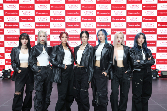 Girl group Dreamcatcher poses for cameras during the showcase event for latest EP ″VillainS″ at Konkuk University in eastern Seoul on Wednesday. [DREAMCATCHER COMPANY]