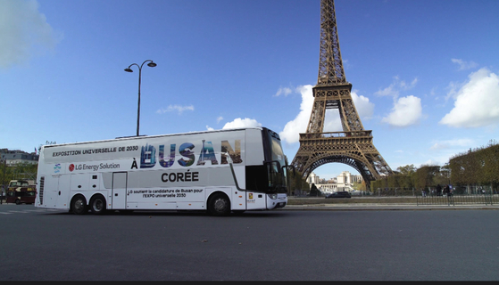 LG wrapped 2,030 buses with Busan's World Expo 2030 banner in Paris. [LG CORP]