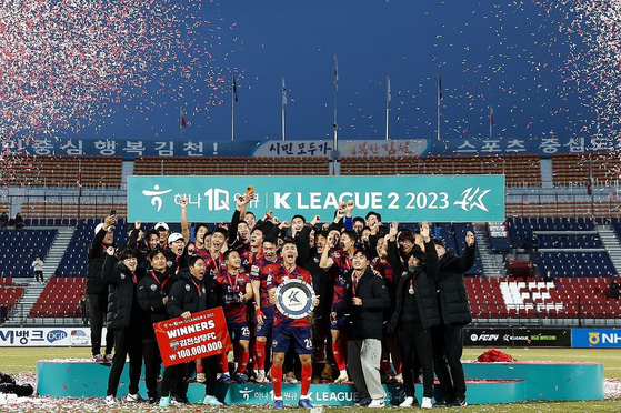 Gimcheon Sangmu players celebrate winning the K League 2 after a 1-0 win against Seoul E-Land at Gimcheon Sports Complex in Gimcheon, North Gyeongsang in a photo shared on the club's official Instagram account on Sunday. [SCREEN CAPTURE]