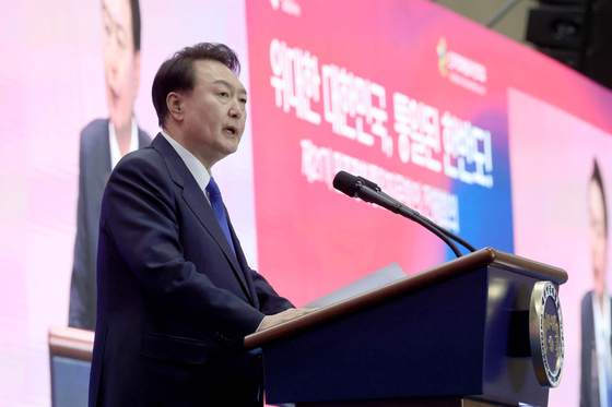 President Yoon Suk Yeol addresses an audience at a conference in Ilsan, Gyeonggi, on Tuesday. [JOINT PRESS CORPS]